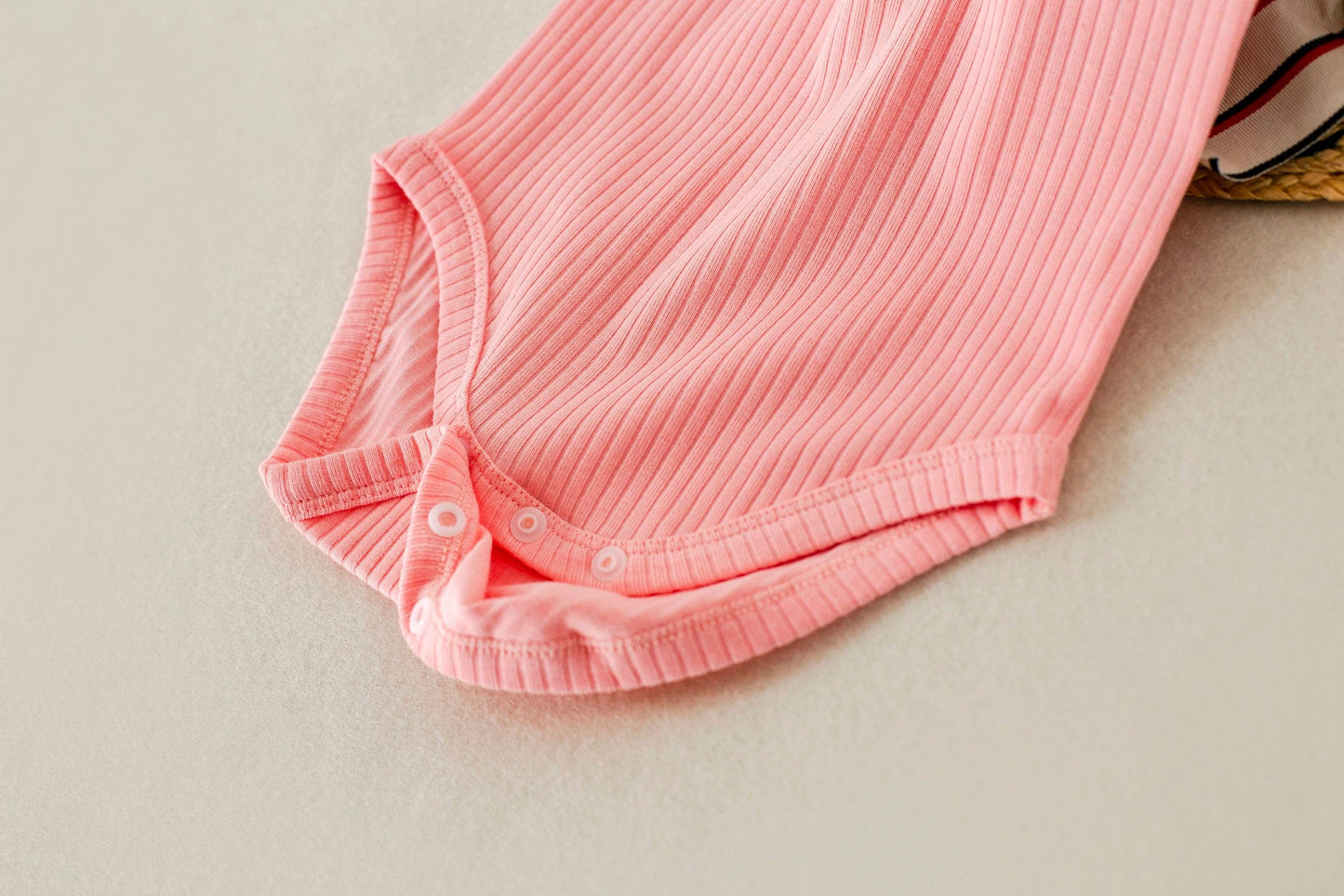 Bubble Gum Ribbed Organic Cotton Onesie