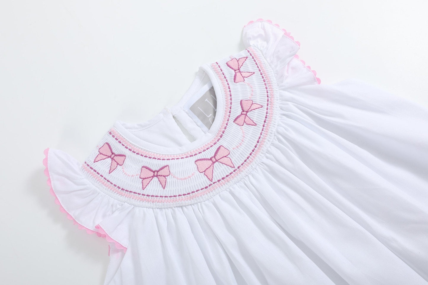 White and Pink Bows Smocked Bishop Dress