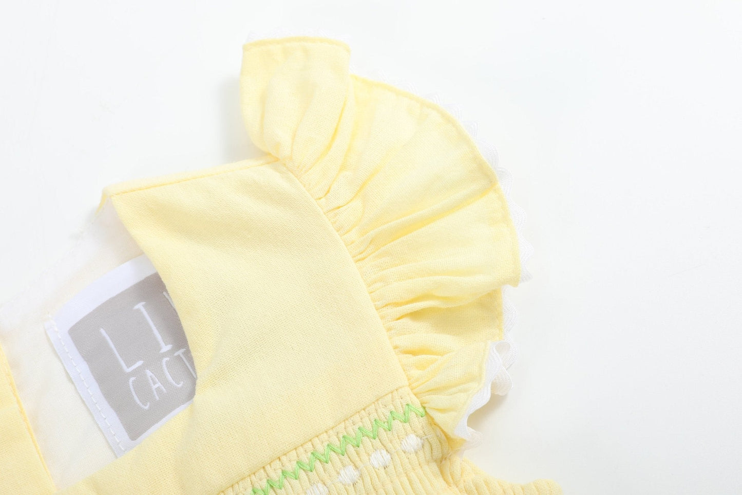 Yellow Daisy Pocketed Smocked Flutter Romper