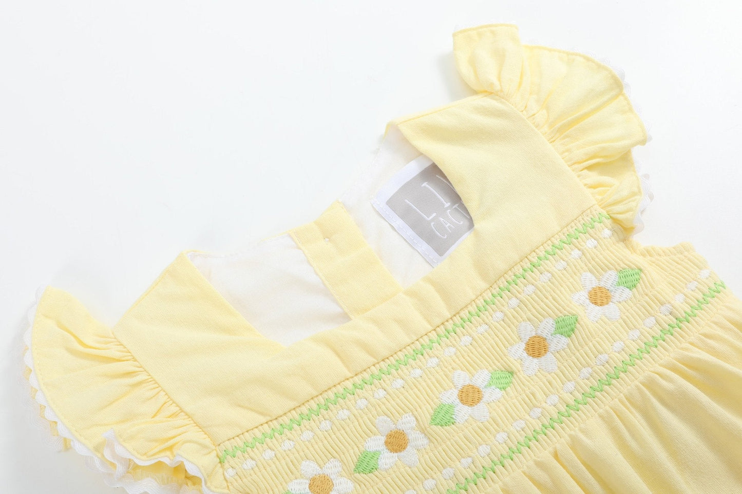 Yellow Daisy Pocketed Smocked Flutter Romper