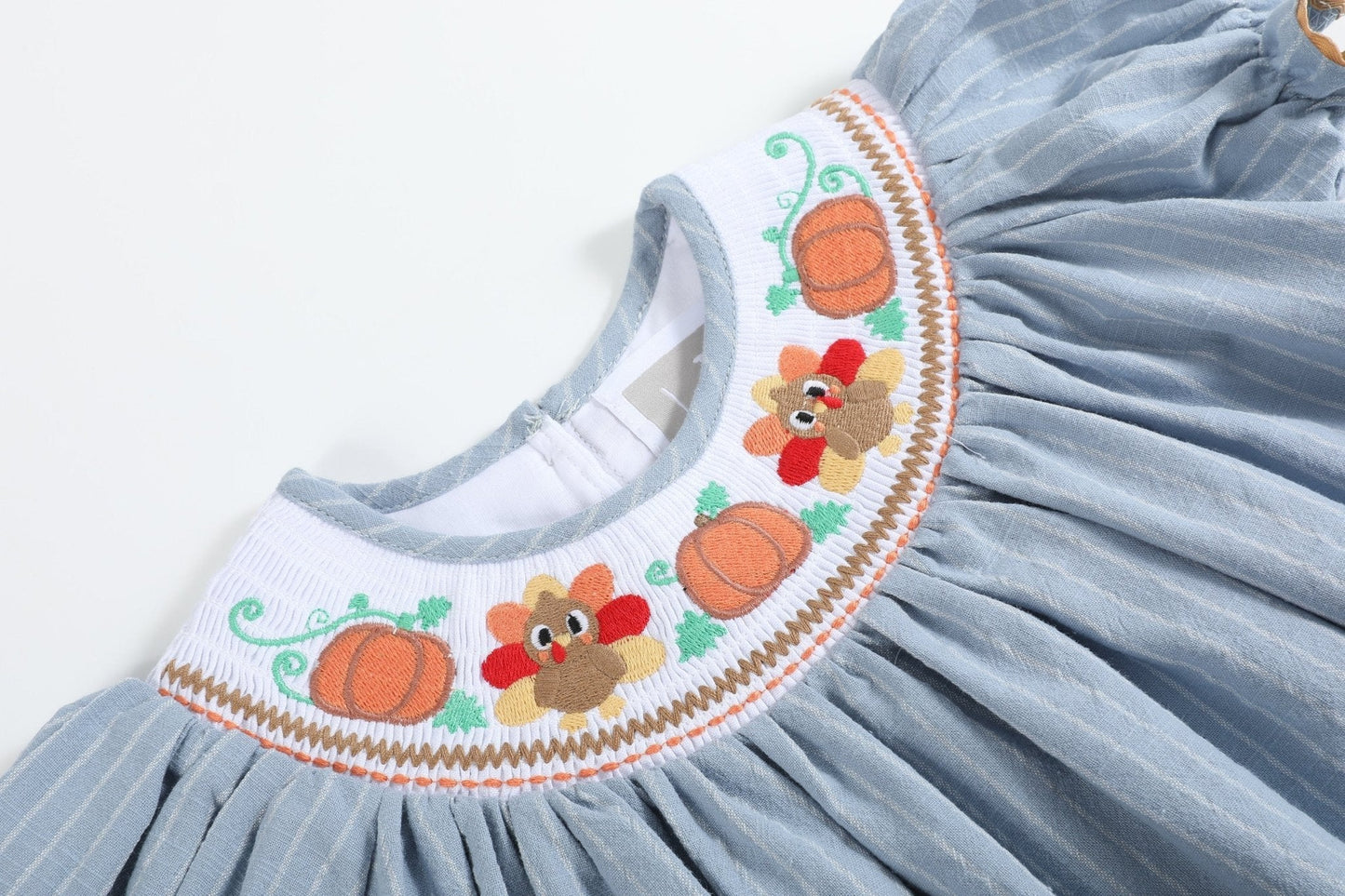 Light Blue Pinstripe Turkey Smocked Bishop Dress